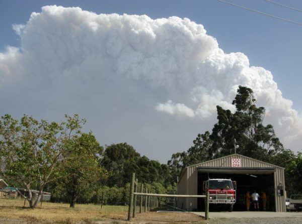 Taggerty Fire hall, with huge plume of smoke rising above. Victorian Bush Fire Diary - Day one