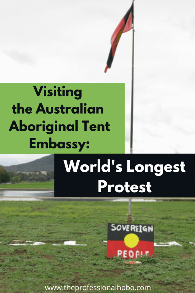the Australian Aboriginal Tent Embassy is the world's longest protest, and a fascinating place to visit. I was scared to talk to some of the people, but as soon as I did I had an incredible afternoon! Here's what happened. #Australia #AboriginalTentEmbassy #protest #travelexperiences #TheProfessionalHobo #longtermtravel #localtravel