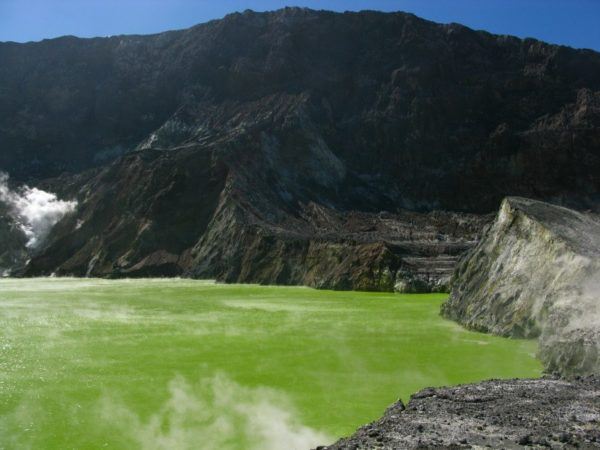 This green lake on White Island, a New Zealand volcanic island, is 10x stronger than battery acid