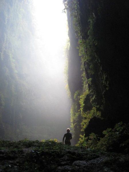 silhouette of Nora Dunn, The Professional Hobo, in a cave in New Zealand