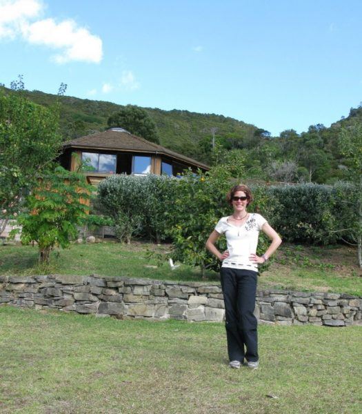 Nora Dunn standing in front of Mana Retreat Centre