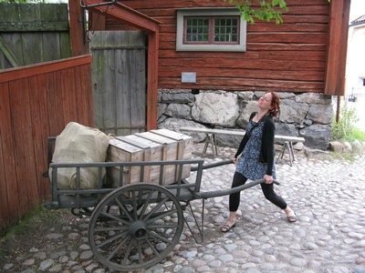 pretending to haul a heavy load at Skansen