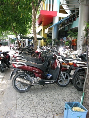 sidewalks in Saigon - aka motorcycle parking