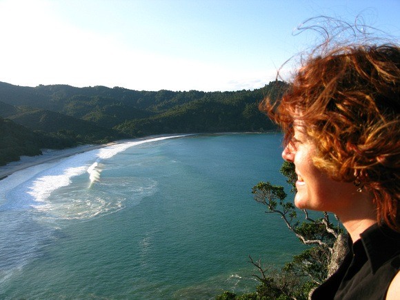 Nora Dunn of The Professional Hobo, overlooking a bay on the North Island of New Zealand