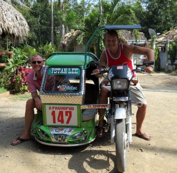 Craig and John of Flaahpack at Forty in a moto-taxi in Pagudpud Philippines