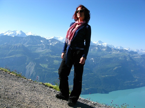 Me modeling the Cosima Cozy Coverup on a mountain. This travel clothes brand is durable!