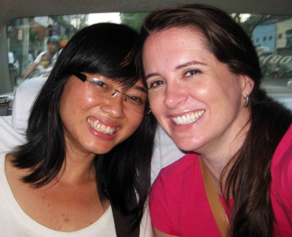 Susan Hurley and a Vietnamese coworker