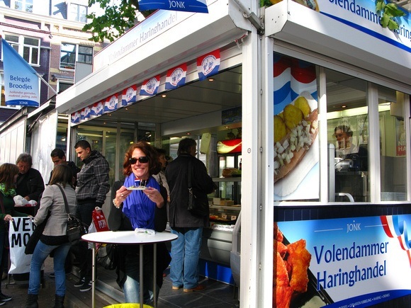 Nora Dunn enjoying herring in Amsterdam