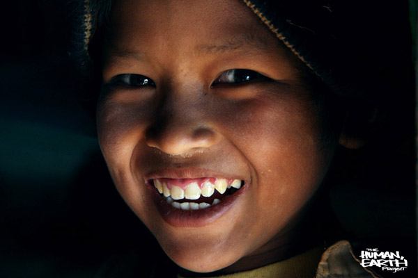 a smiling Burmese child portrait, since disappeared from child trafficking