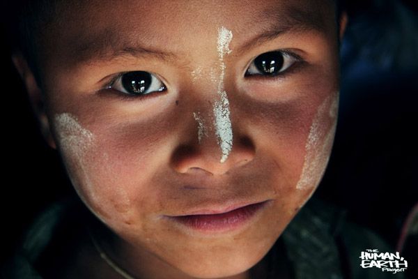 Curious child in Asia, photographed for the Human Earth Project, since disappeared