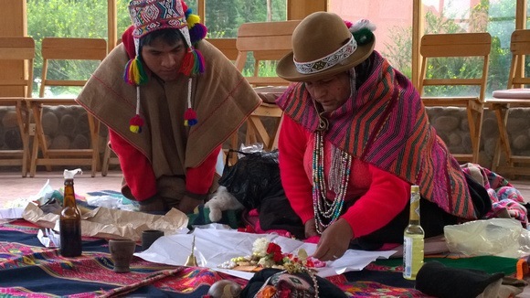 Juanita, a Peruvian shaman, creating a despacho