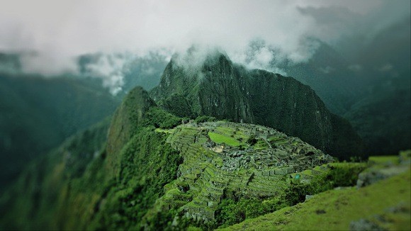 a view of Machu Picchu from the trail to the Inca bridge