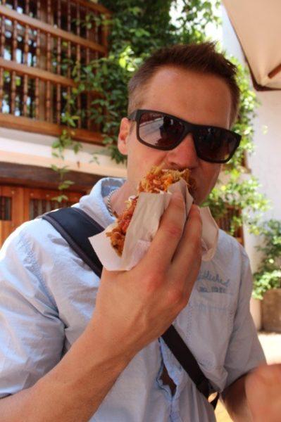 Russ eating a patacon in Colombia
