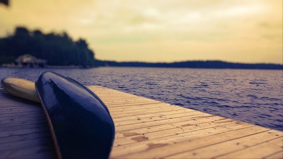 canoe on a dock on Lake Muskoka