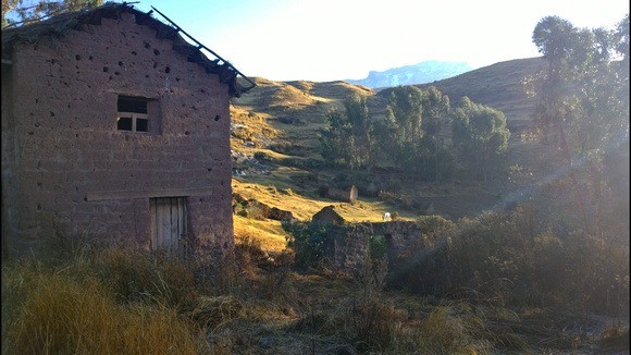 Two-storey mud brick home in the Andes