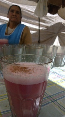 A glass of fruitillada, a form of Chicha, at a street market in Peru