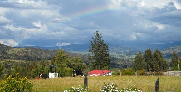 Colombia life can be magical! Here is a Colombia landscape outside Bogota with a rainbow