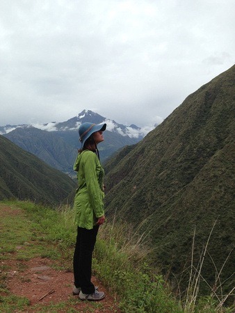 earning income while traveling; Nora Dunn overlooking the Sacred Valley in Peru