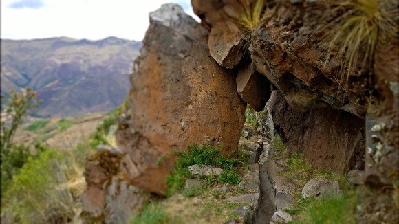 water channel going through rock formation in Tipon