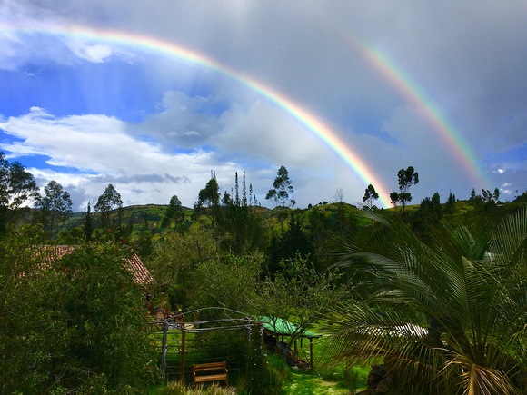 Double rainbow over the Andes of Ecuador. Visiting the Andes in Ecuador or Peru? Tough choice. 