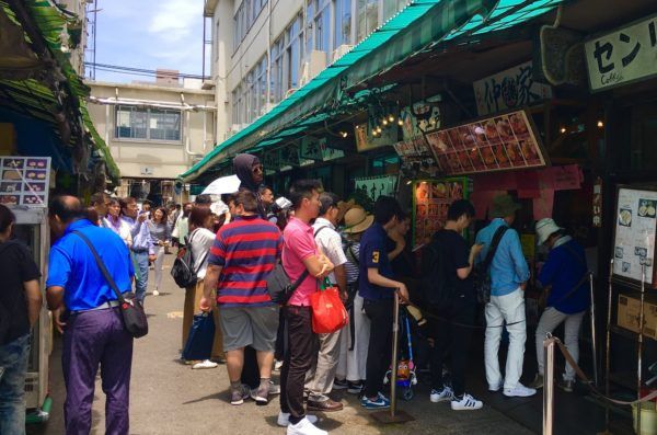 lining up at Tsukiji Fish Market outer market