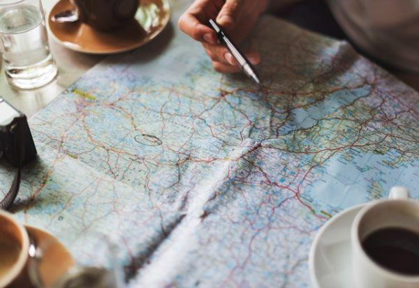 travel planning with a map - create your travel expenses budget before you go