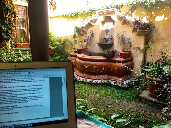 Working on a laptop in the garden of Canela - a great bakery and restaurant in Antigua Guatemala