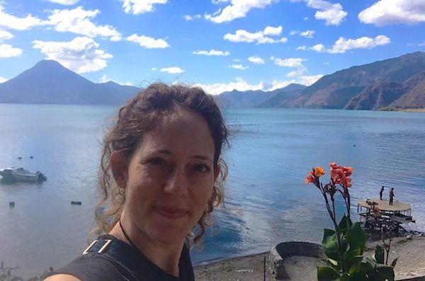 Nora Dunn, The Professional Hobo, at Lake Atitlan, Guatemala. I share my Guatemala travel tips here! 