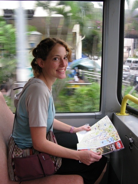 Nora Dunn, The Professional Hobo, navigating the bus in Singapore