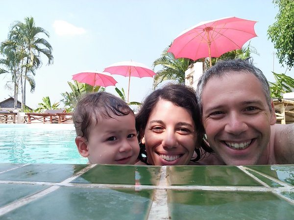 Shlomo Freund (of Free Financial Self) and his wife and daughter in a pool