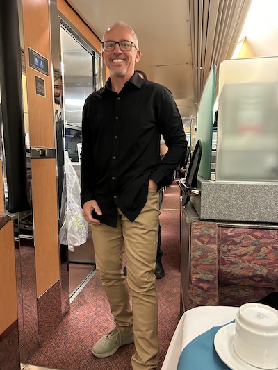 My fella in top-to-toe merino wool: Unbound Merino relaxed travel pants, and Unbound Merino button-down