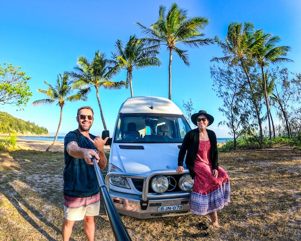 Jarryd and Alesha of Nomadasaurus with a campervan