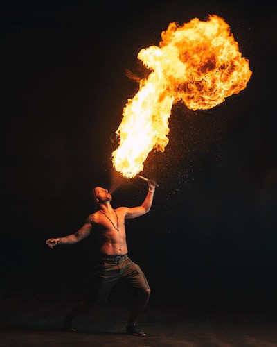 Mike Corey breathing fire