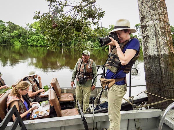 Susan Portnoy working as a freelance travel photographer in the Amazon
