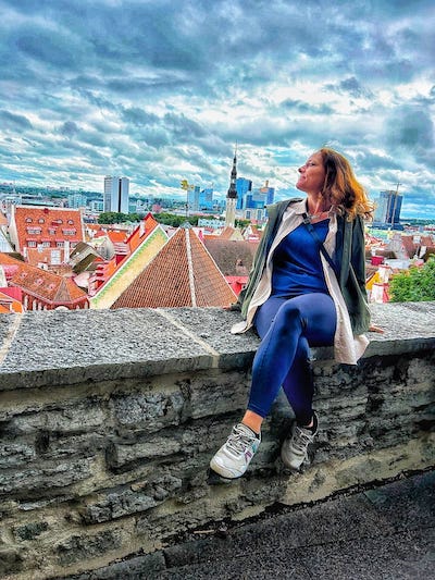 Nora Dunn of The Professional Hobo looking out over Tallinn Estonia Nora Dunn of The Professional Hobo looking out over Tallinn Estonia